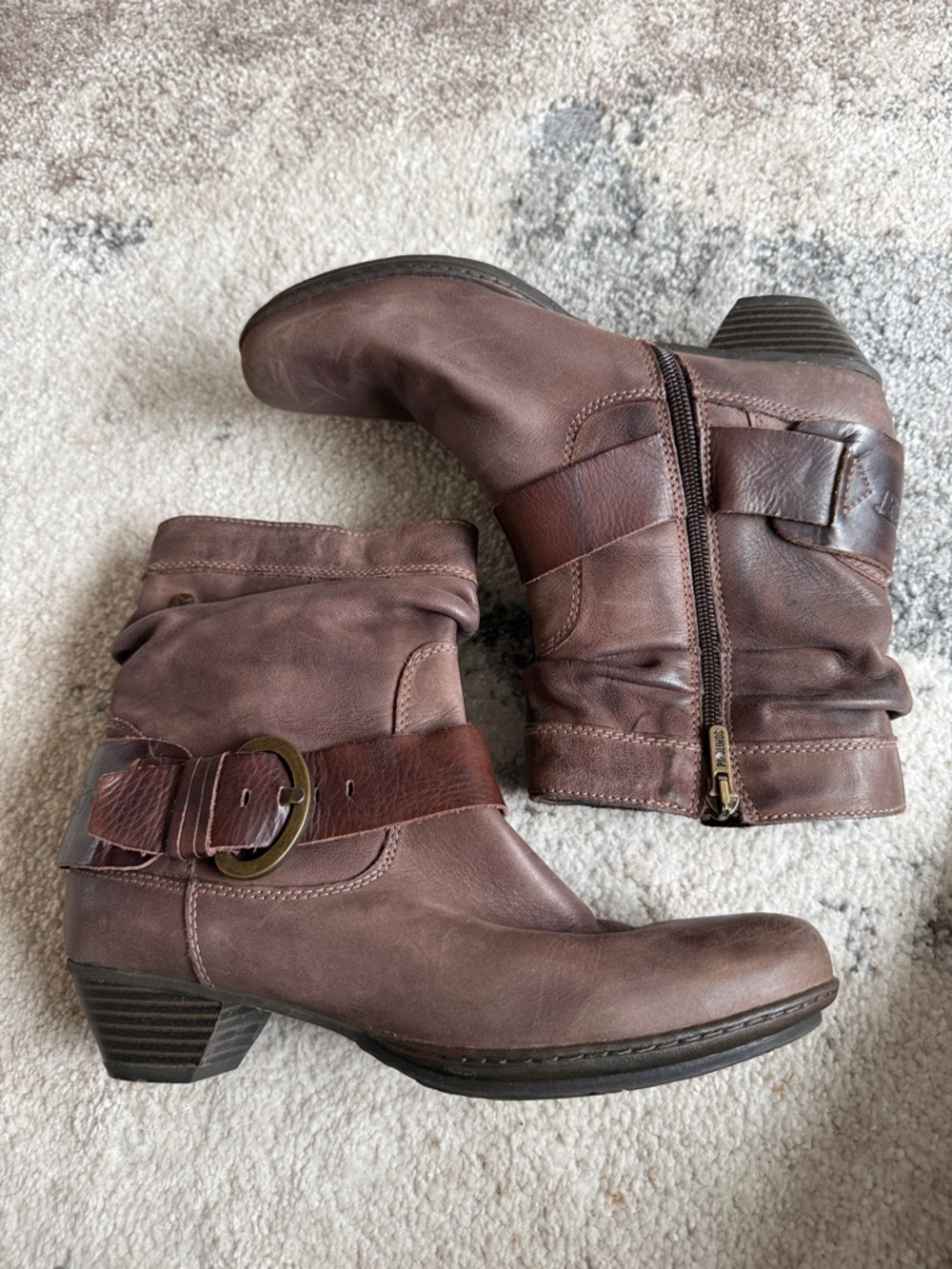 Pikolinos Brujas slouchy leather ankle boots with strap and buckle detail.